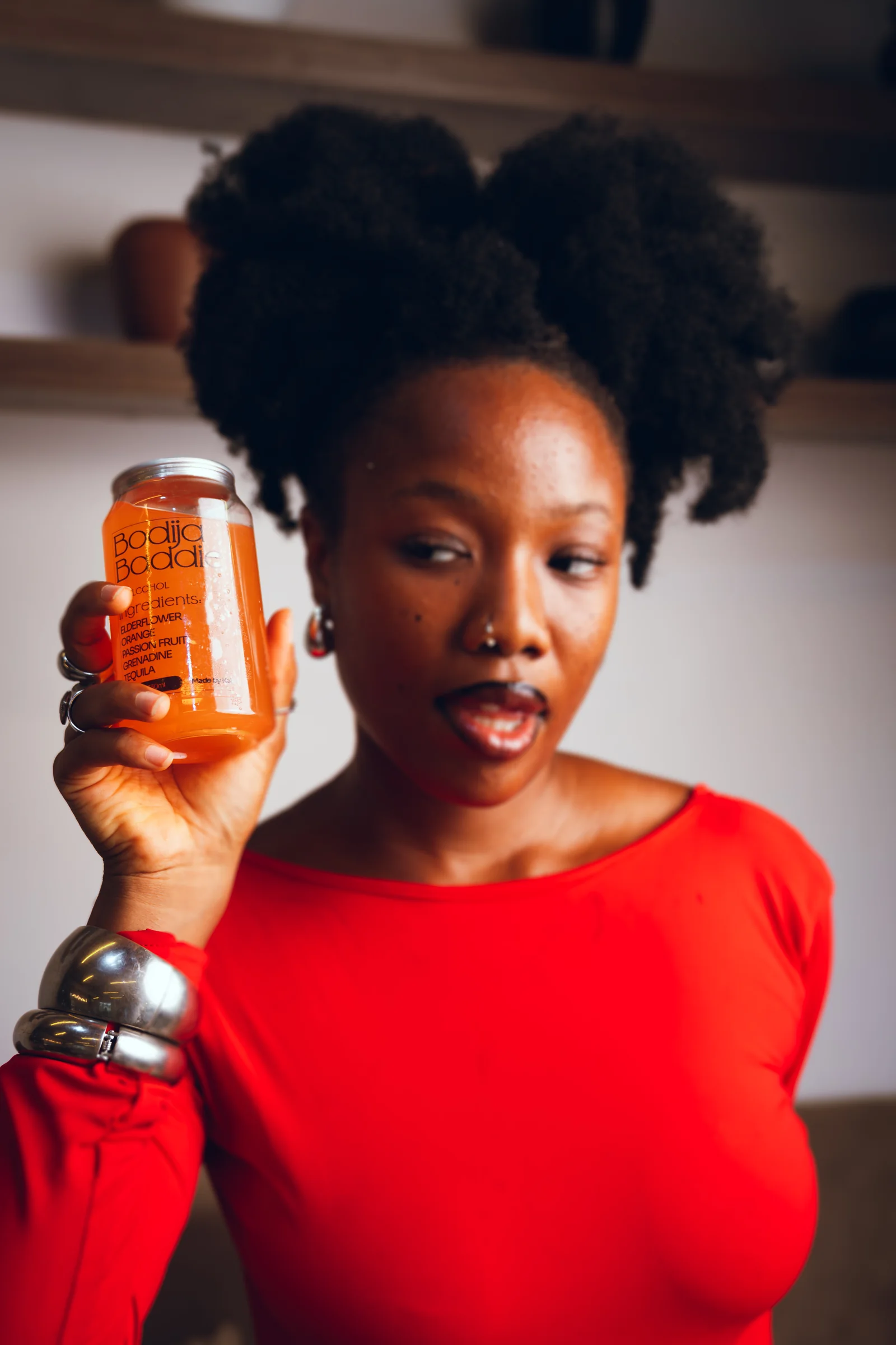 Lifestyle, a customer holding a branded kabs.bar can