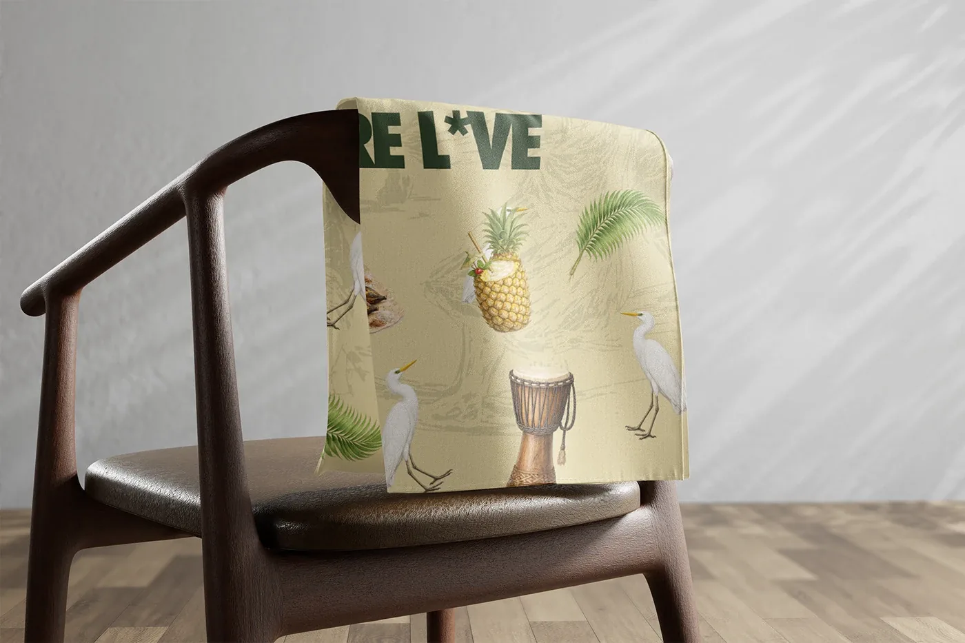 Vive l’Amour patterned scarf draped over a chair